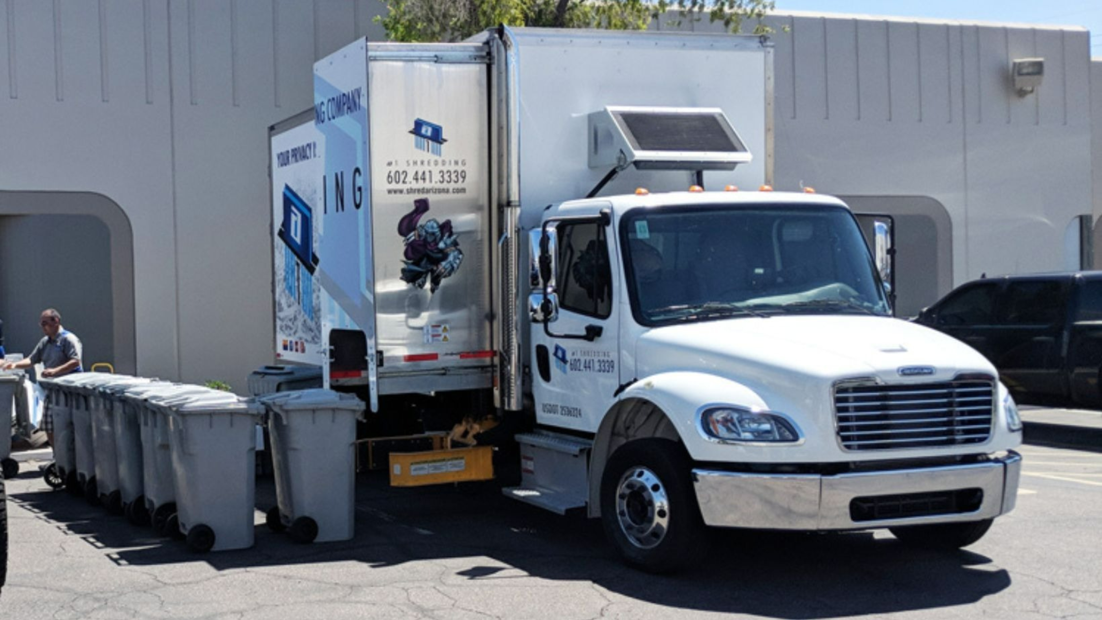 A-1 Shredding mobile shredding truck with secure collection containers ready for on-site document destruction.